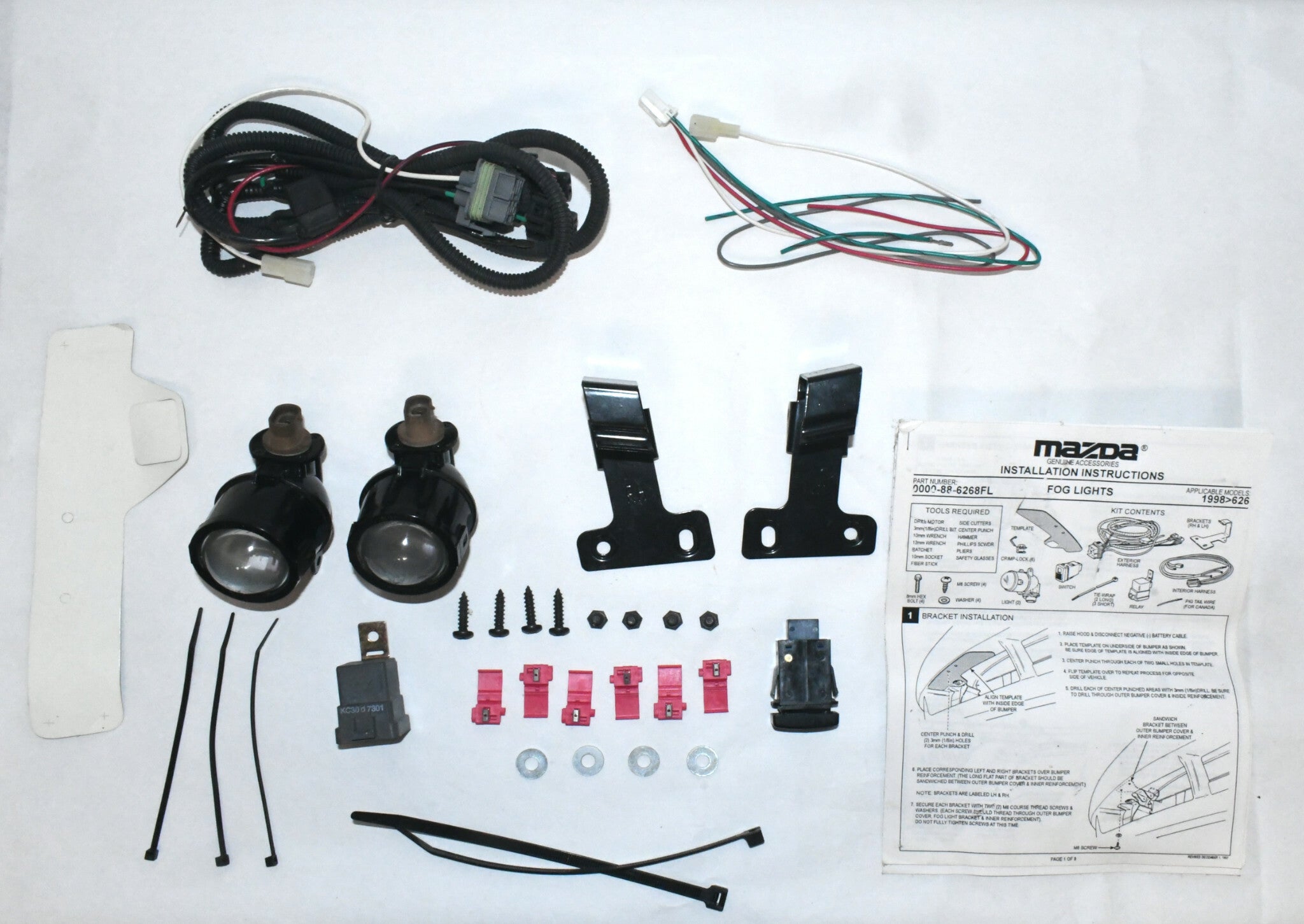 NEW genuine accessory fog light kit for 1992-98 Mazda 626 0000-88-6268